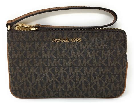 michael kors wristlet purses|Michael Kors large wristlet clutch.